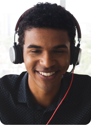 Teenager wearing headphones and smiling